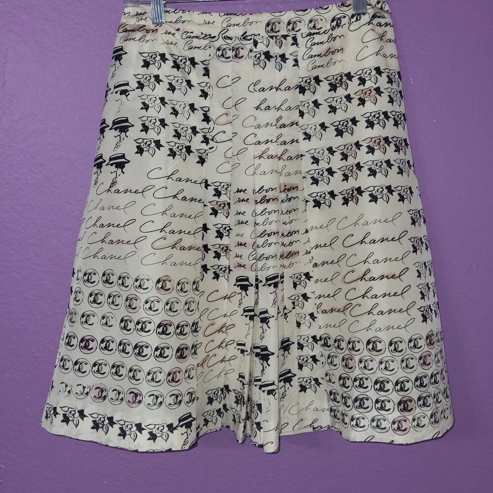 Chanel 06C Pleated Skirt CC Logo Camellia Silk Mademoiselle Beige Size 36 EU